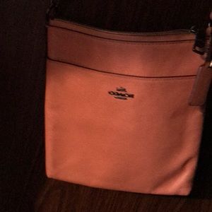 Salmon colored coach purse 80$ Firm